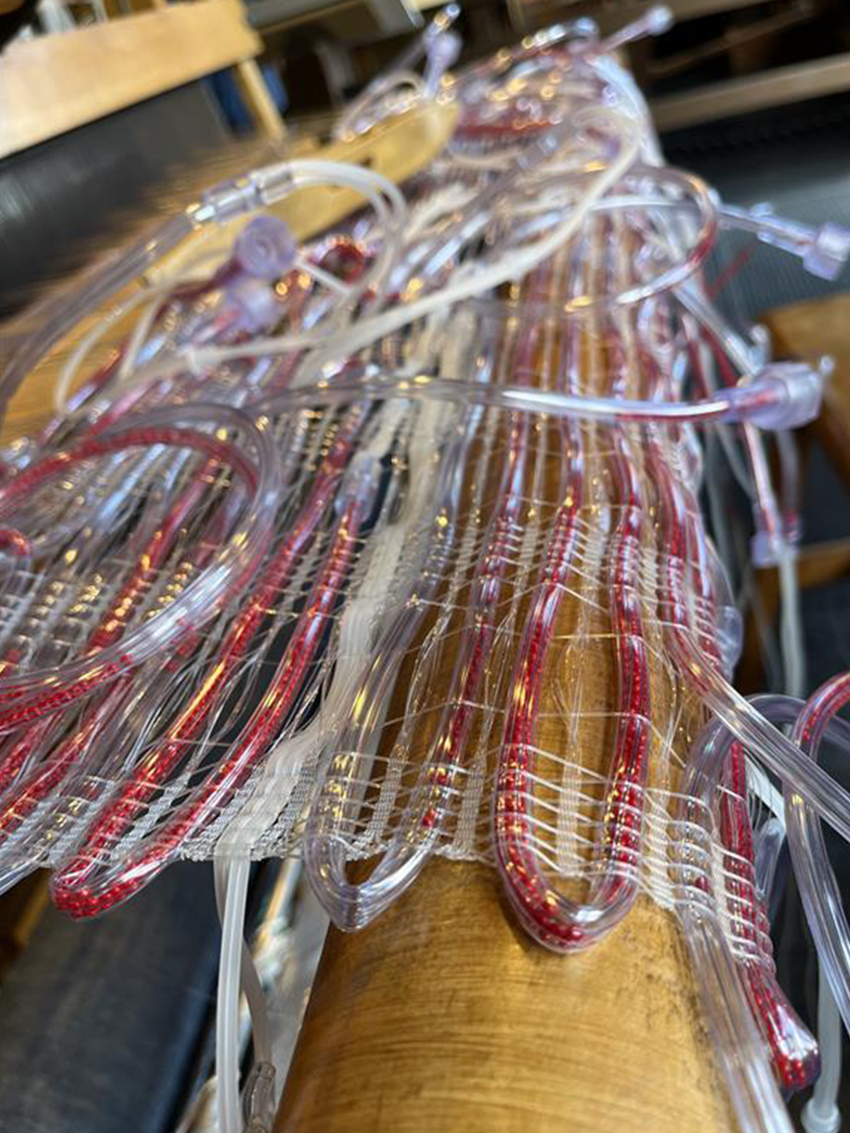 Detail of woven piece of art on a loom