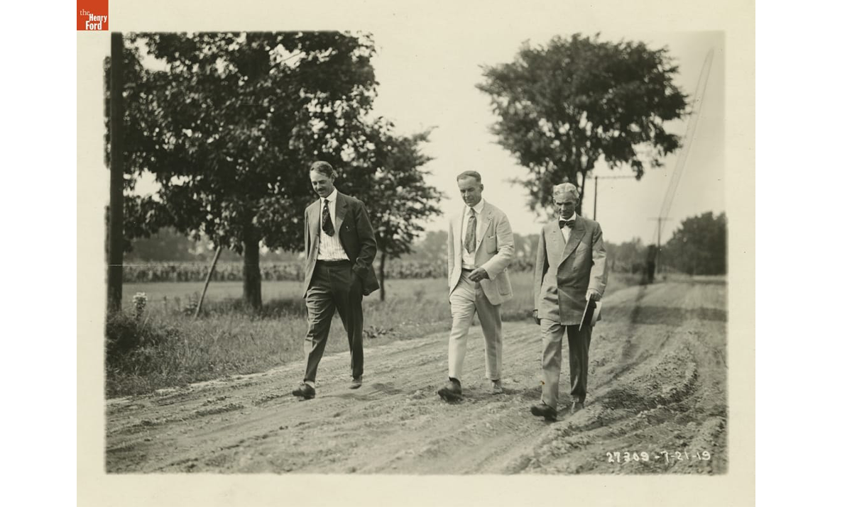 Ambrose B. Jewett of Ford Advertising Department is visible at center, with painter Irving Bacon (left) and Henry Ford (right), 1919