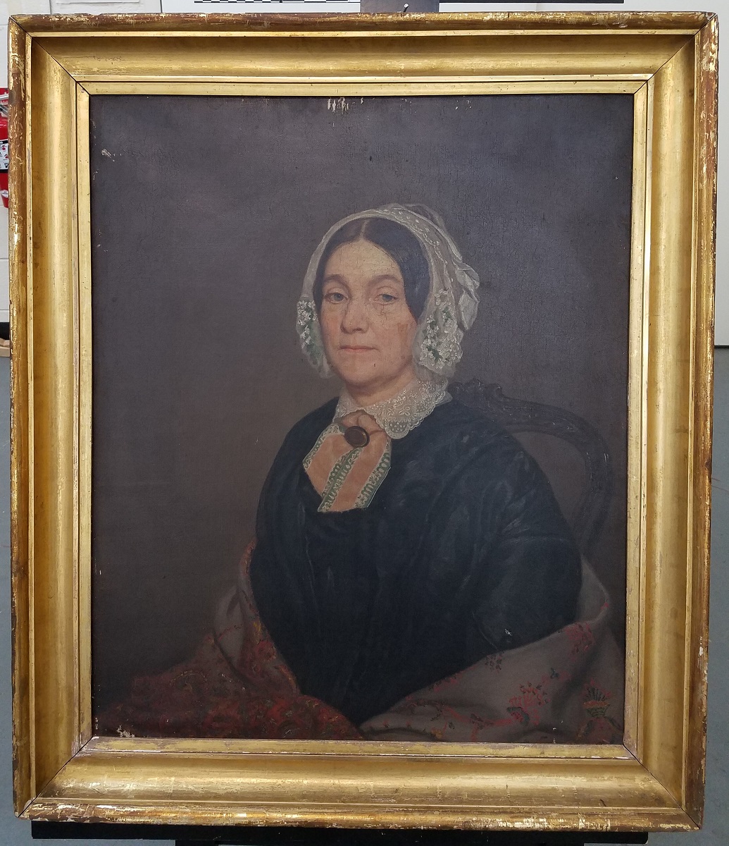 “Lady in a Lace Bonnet Painting of woman in black dress, shawl, and lace bonnet in gold frame