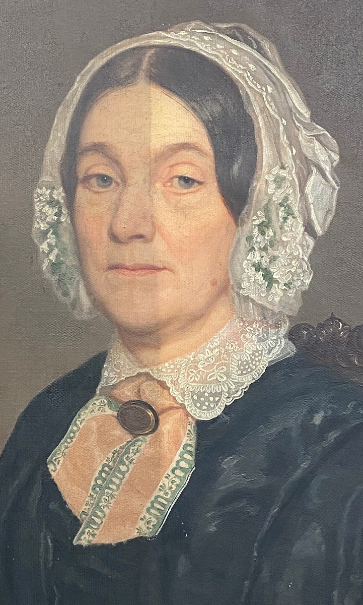 Grime cleaning, with right side cleaned Detail of woman in black dress and white lace collar and bonnet; right half is lighter and brighter than left half