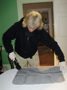cleaning a historic textile in Noah Webster's home