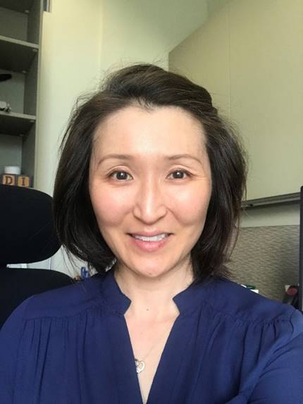 Agnes Ang, Thousand Oaks, California Woman with medium-light skin and dark hair in a blue shirt