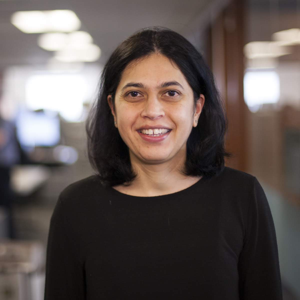 Rachel Singh, Seattle, Washington Medium-skinned woman in black top