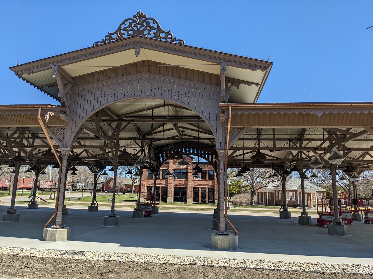 Detroit Central Market entrance that originally faced north Detail of open-sided building with many support columns and decorative elements around roof