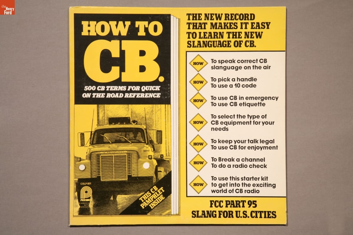 Record Album, Yellow record cover with text and image of front of large truck