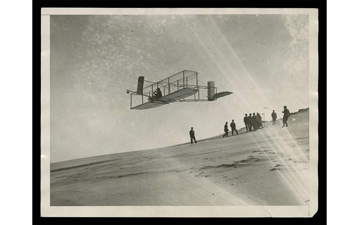 Orville Wright making glider tests at Kill Devil Hills, North Carolina, 1911. / THF111115