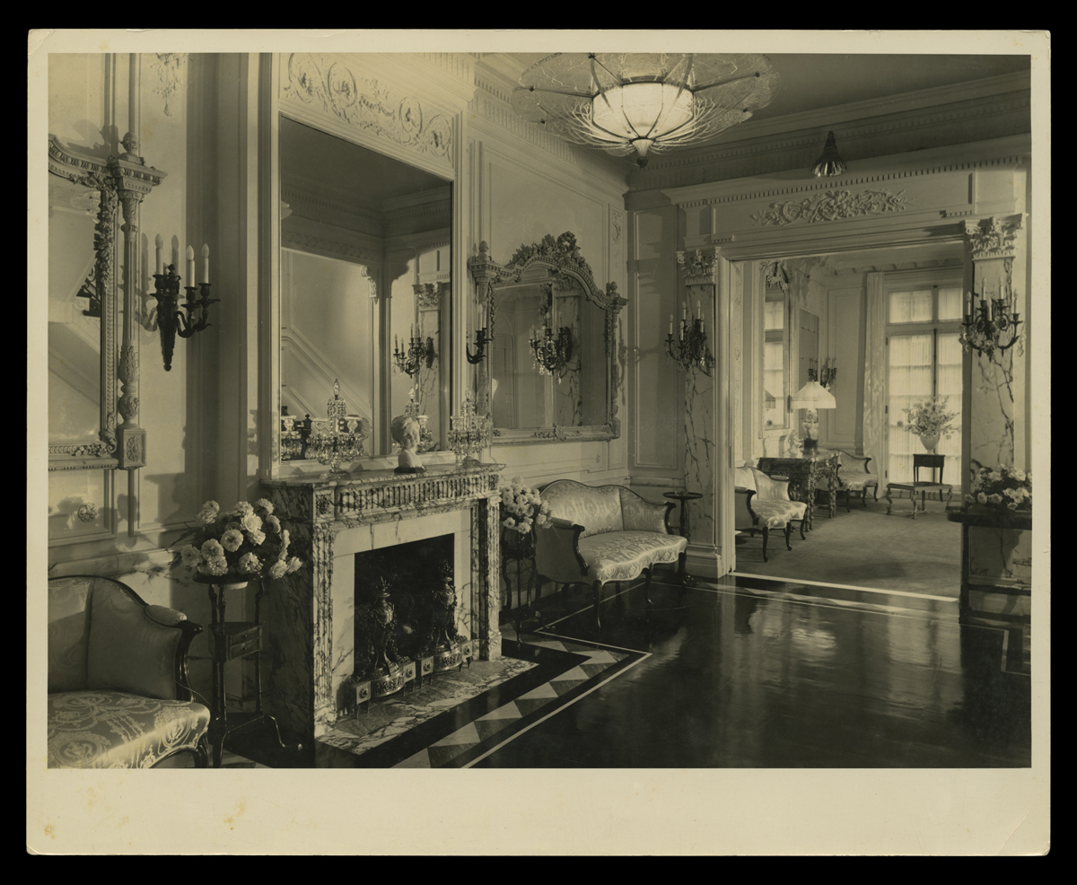 Upscale room with marble fireplace and luxurious furnishings