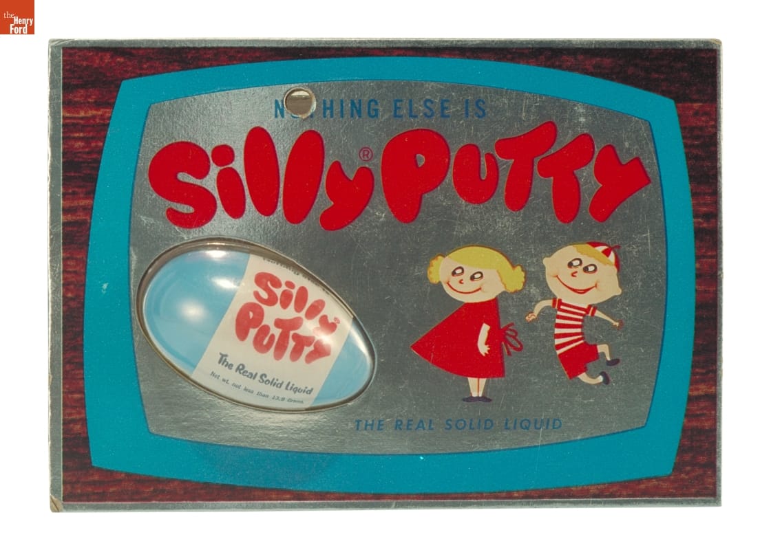 Silly Putty, circa 1962 Plastic blister pack containing blue plastic egg with red and white label