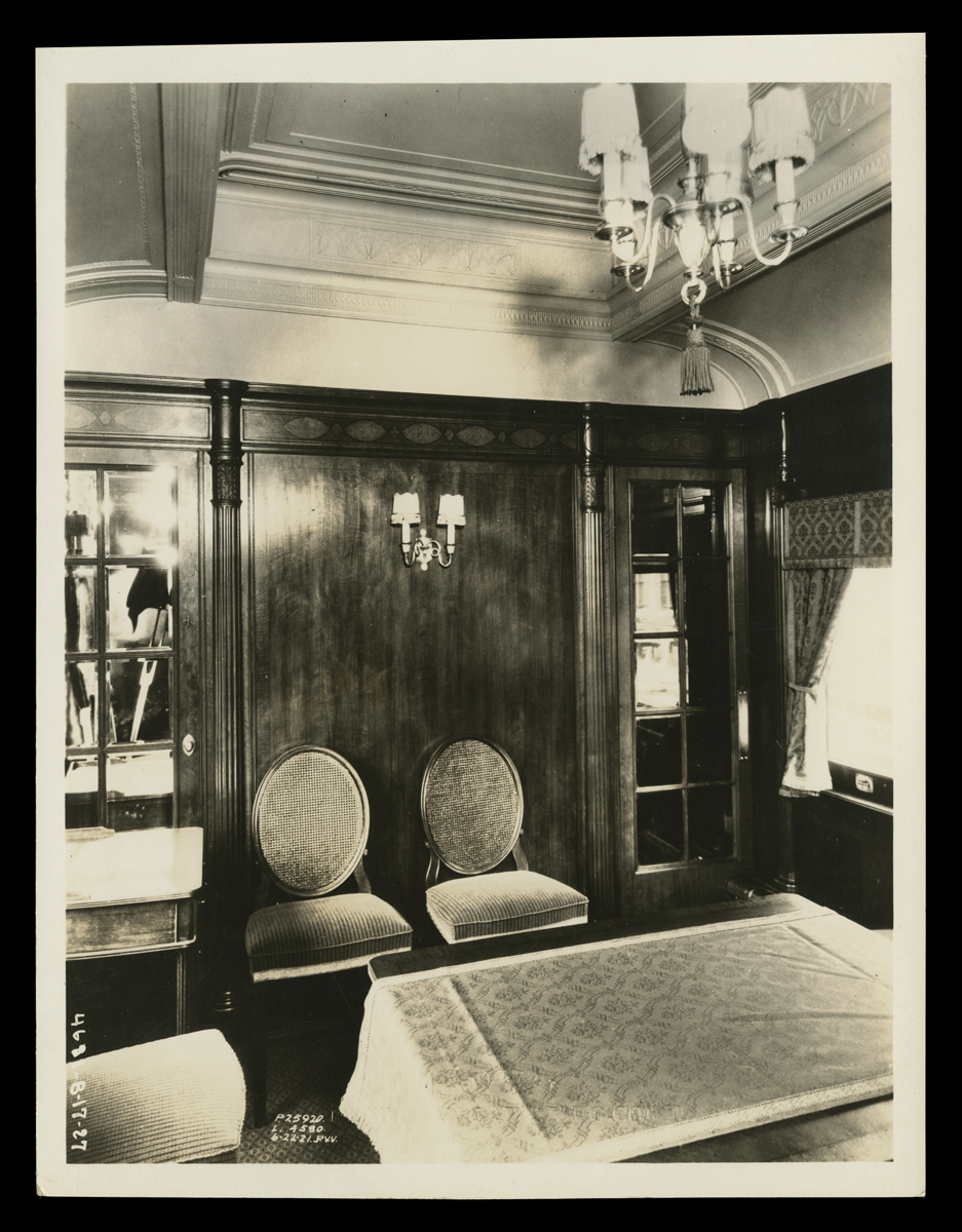 Interior of Henry Ford's Private Railroad Car, Interior of room with wood paneling, arched ceiling, and furniture