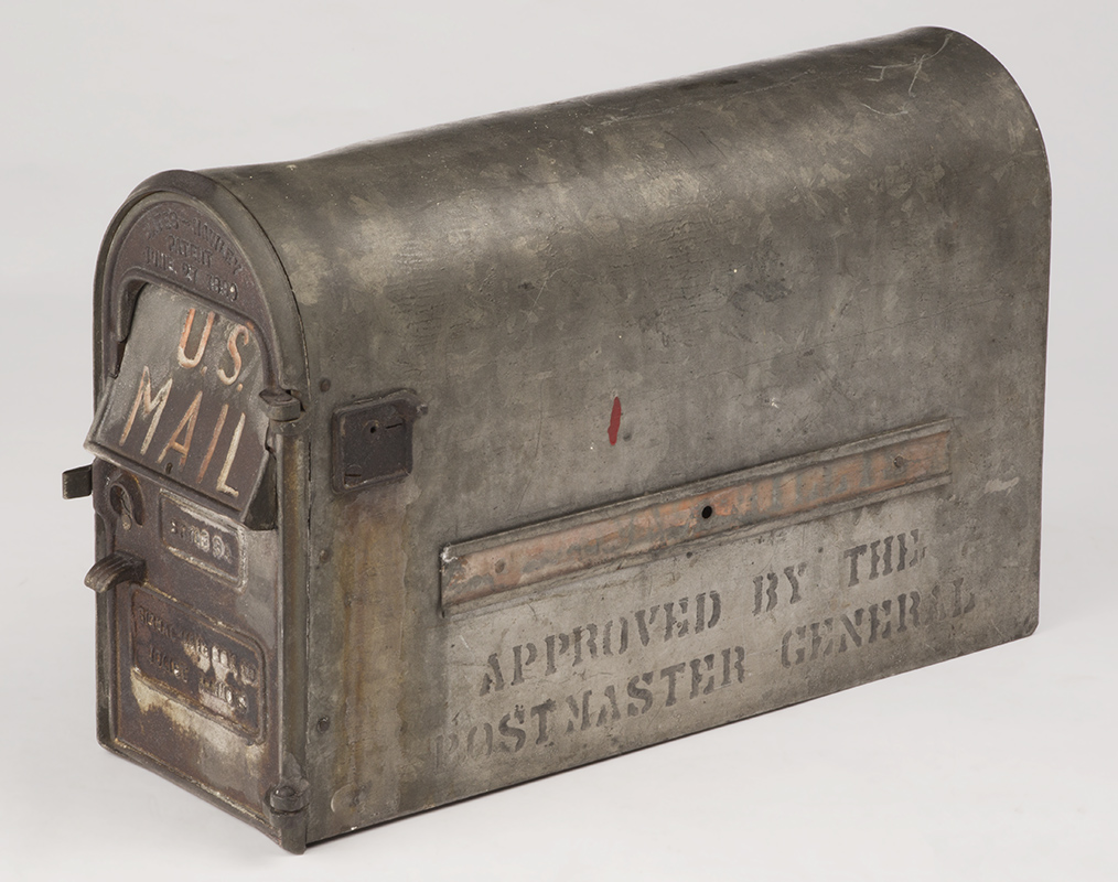 Rural Free Delivery Mailbox, 1900-1916 Silver arch-shaped mailbox with text on front and side