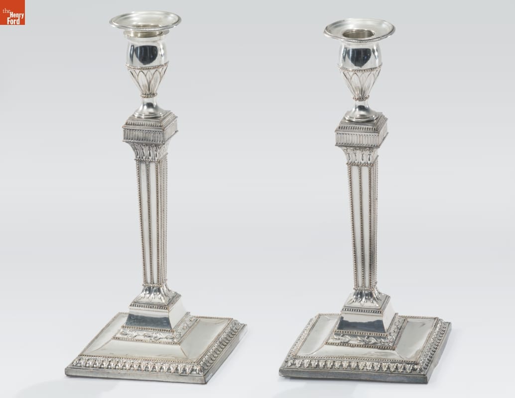 Candlesticks, Used by Alexander Hamilton, 1780-1800 Silver candlesticks with wide square bases, pillar-like columns, and intricate decorative etching