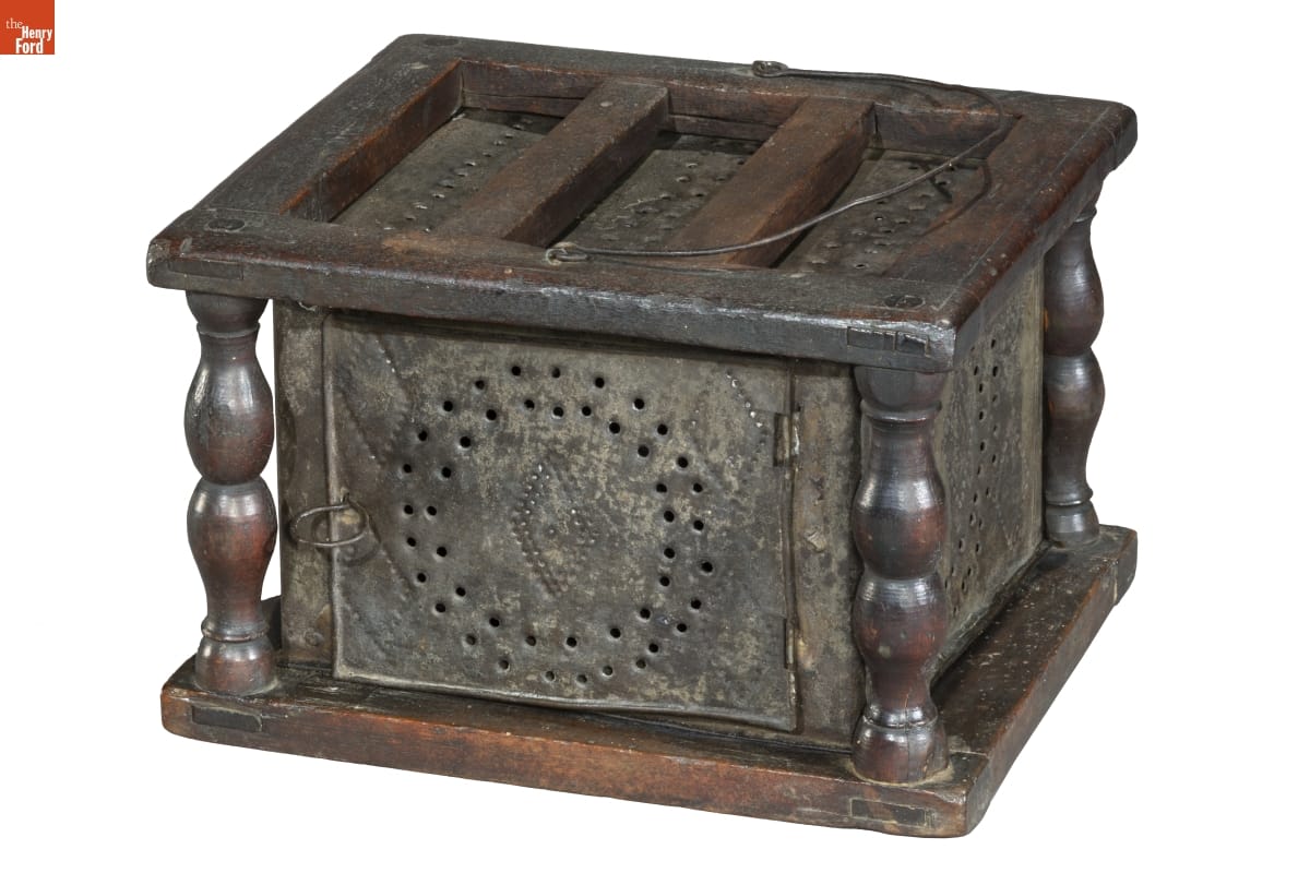 Footwarmer, 1830-1860 Metal box with perforations and decorations on sides and top
