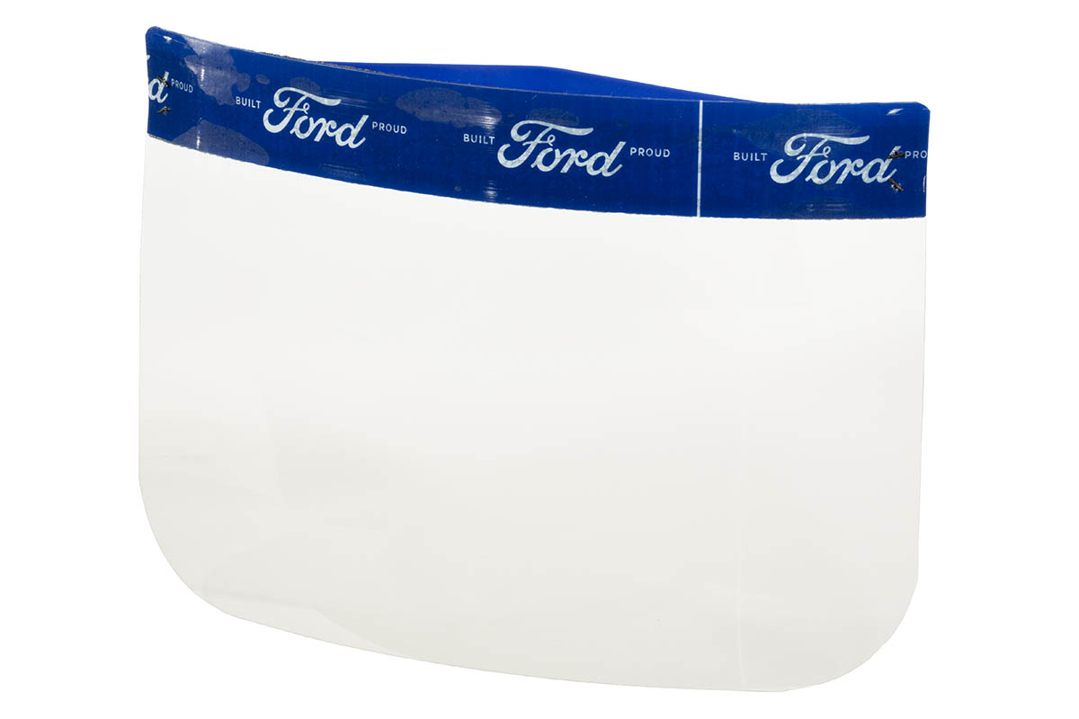 Clear plastic rectangle with rounded corners, topped with blue band patterned with white text 