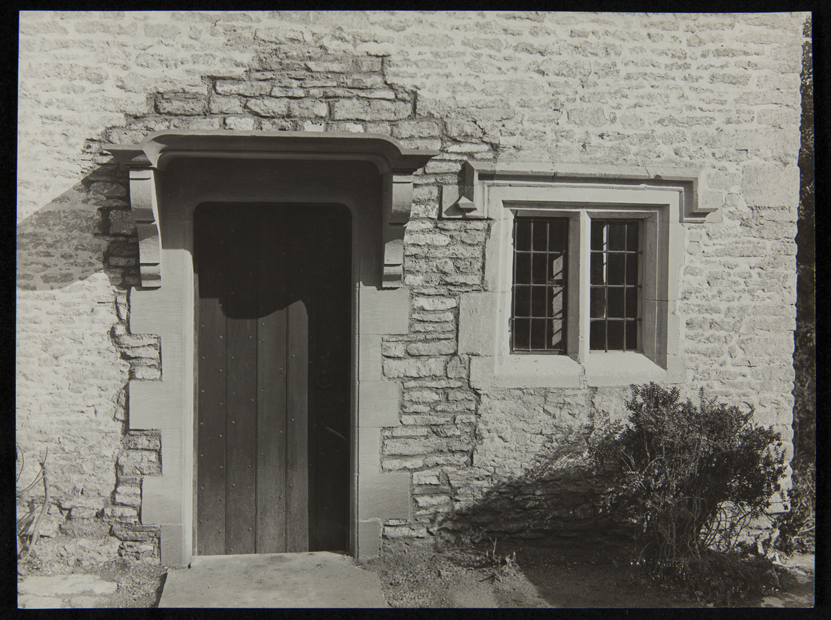 Exterior of Cotswold Cottage at its Original Site, Chedworth, Gloucestershire, England, 1929-1930 Door and window set in stone wall