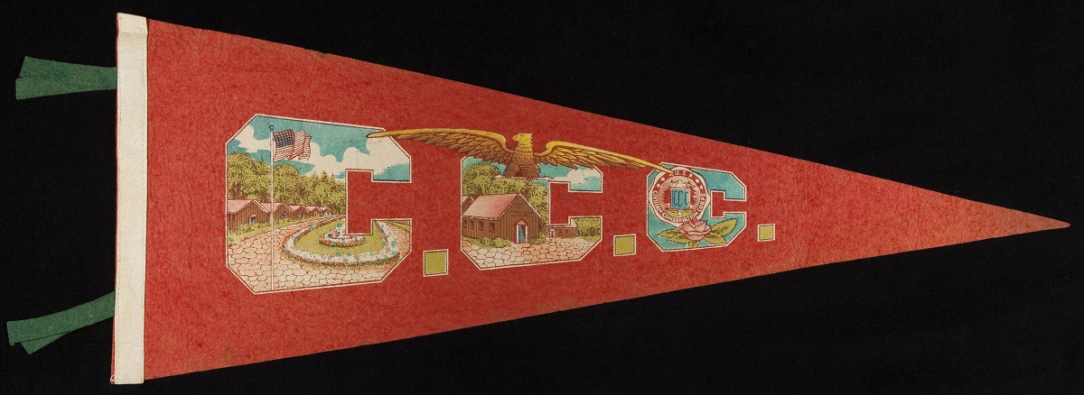 Red pennant with golden eagle and block letters 