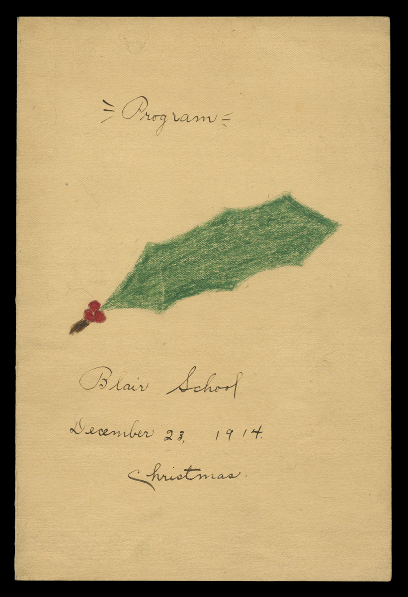 Page with handwritten text and holly leaf and berries drawn with crayon (?)