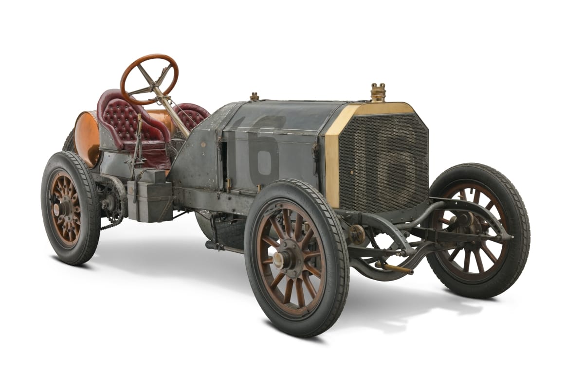 Long open car with number 