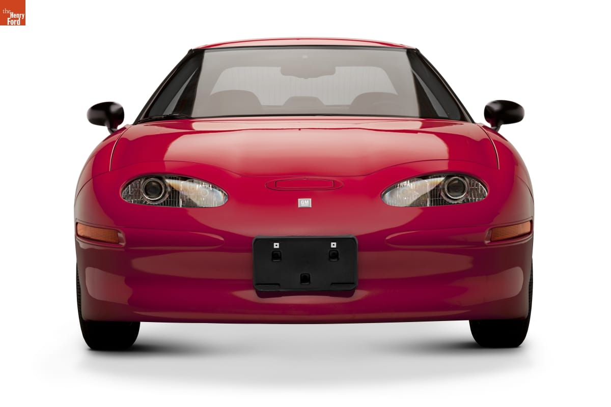 Front view of compact red car