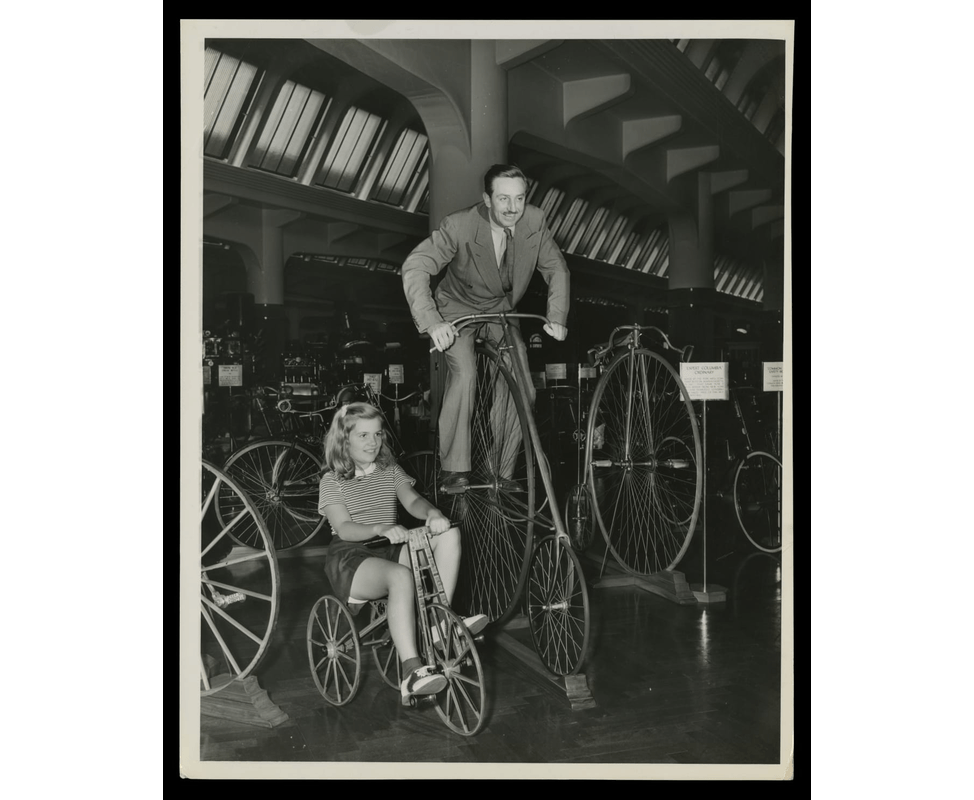 GIF slowly cycling through three images of man and young girl in a museum